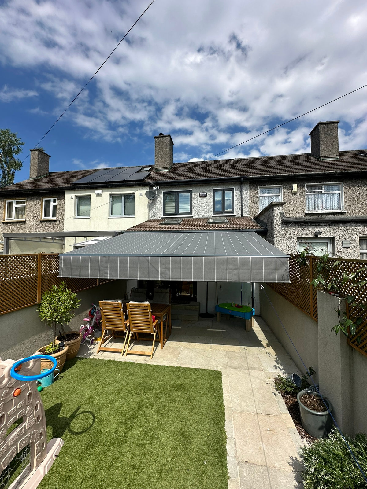 Custom-Bracket Awning with Rollable Front in Rialto