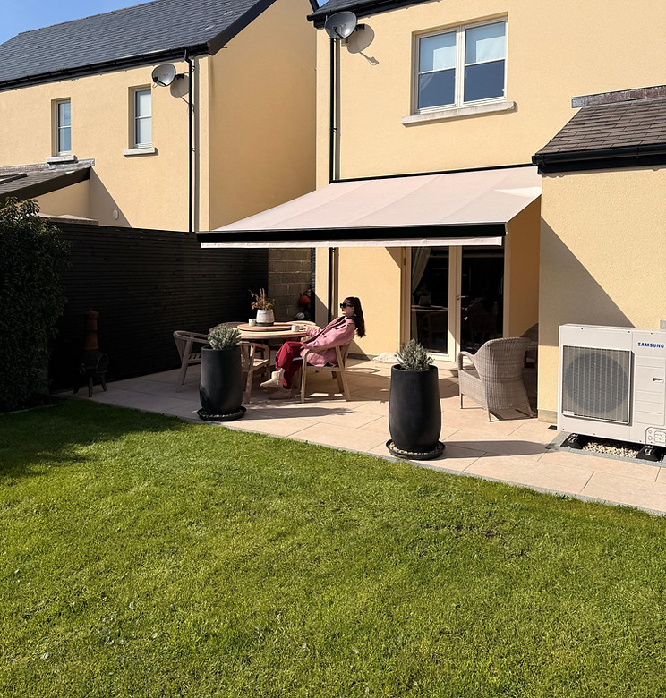 Retractable awning installed over a residential patio in Ireland
