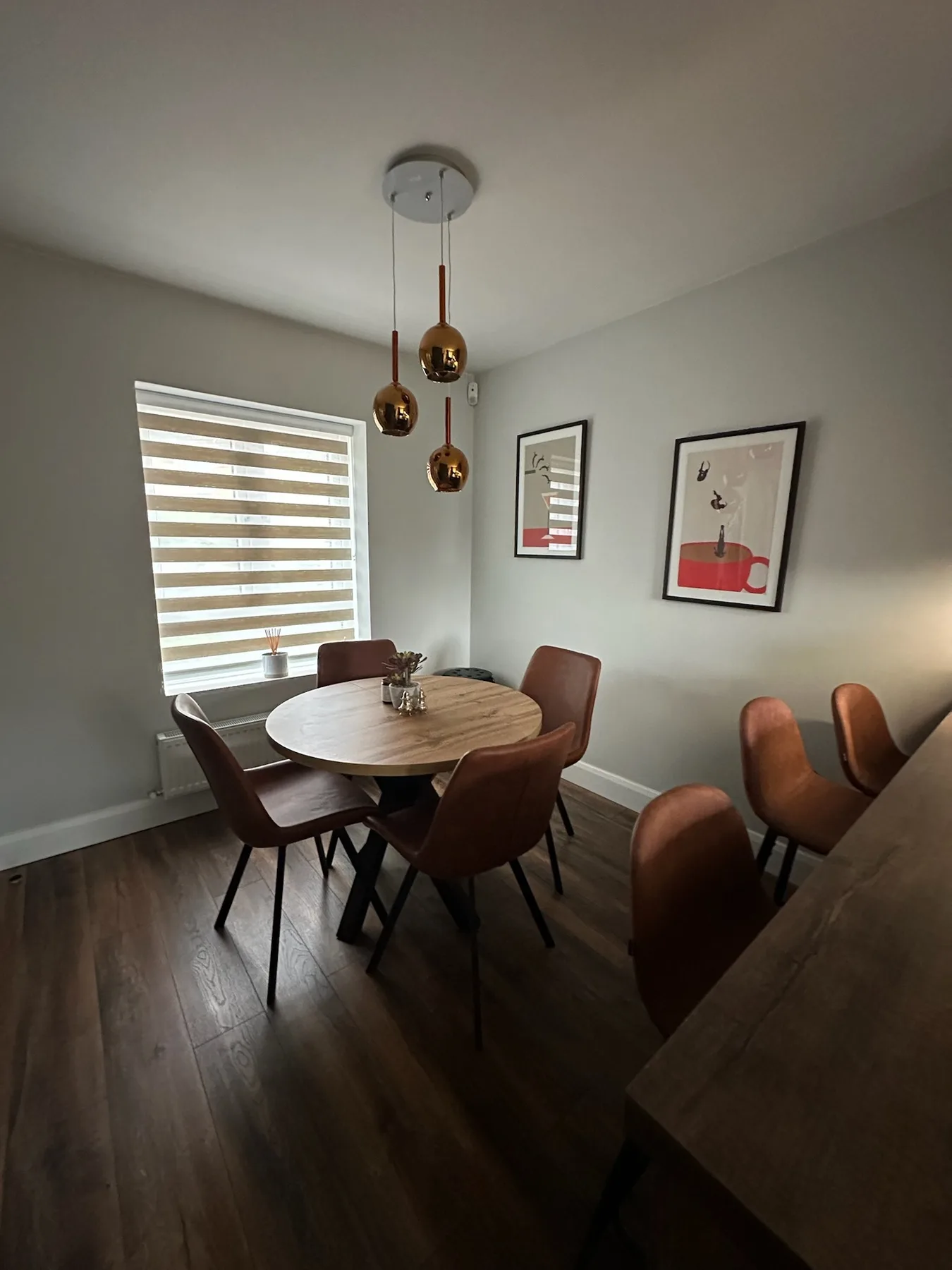 Day and night blind fitted in a compact dining area
