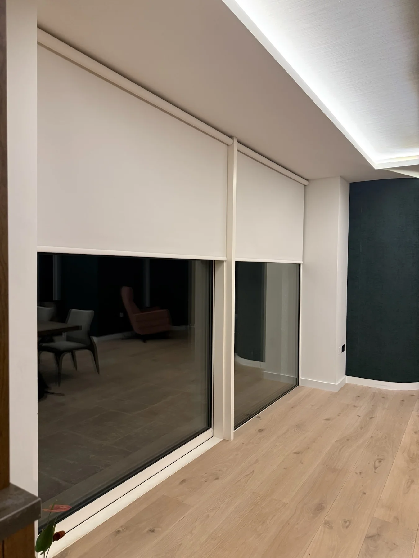 White electric roller blinds lowered for evening privacy in a Maynooth home