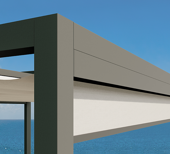Close view of a retractable pergola front profile and fabric valance detail