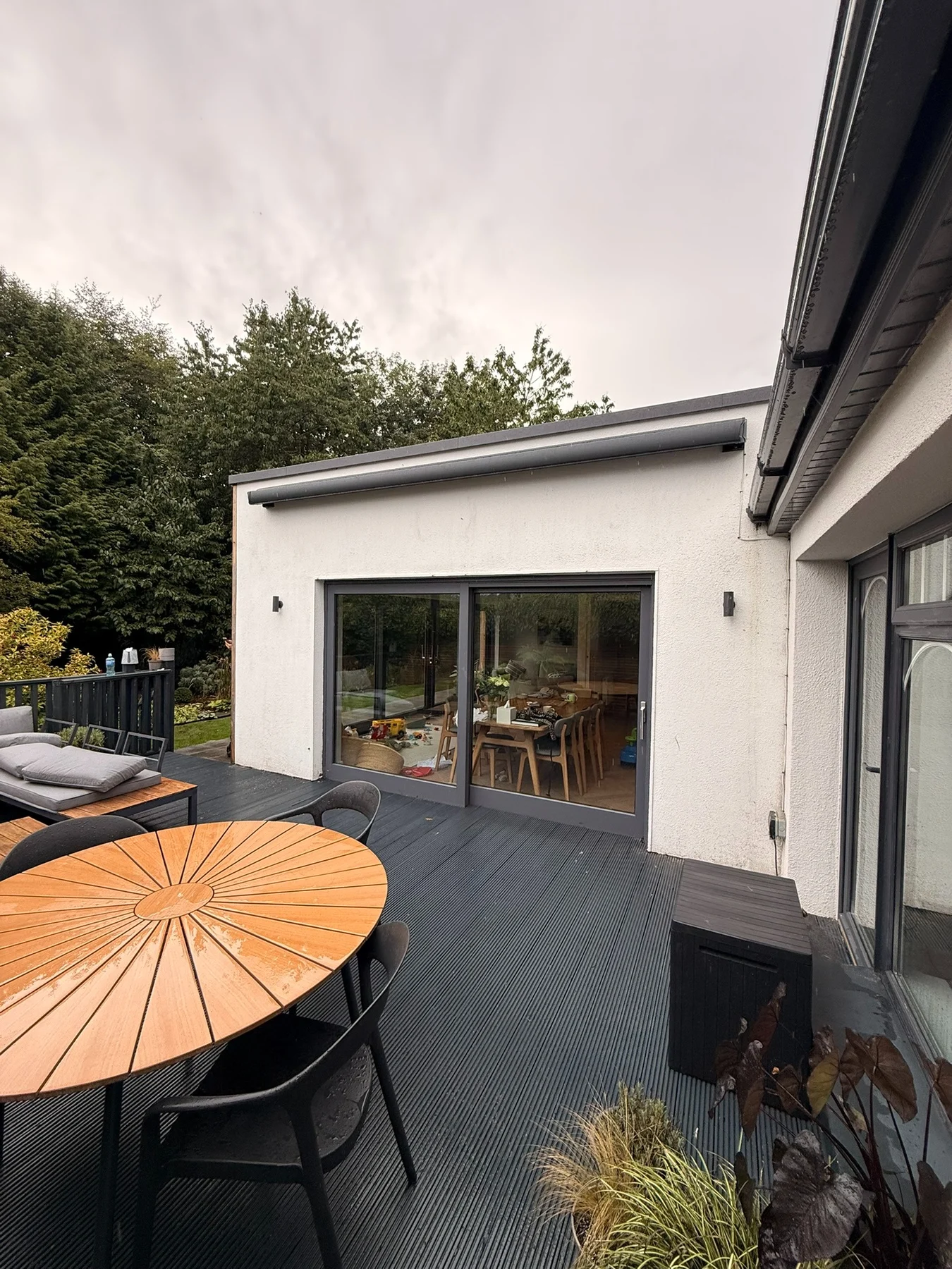 SLIMLINE full cassette awning fully retracted above a modern patio in Dublin