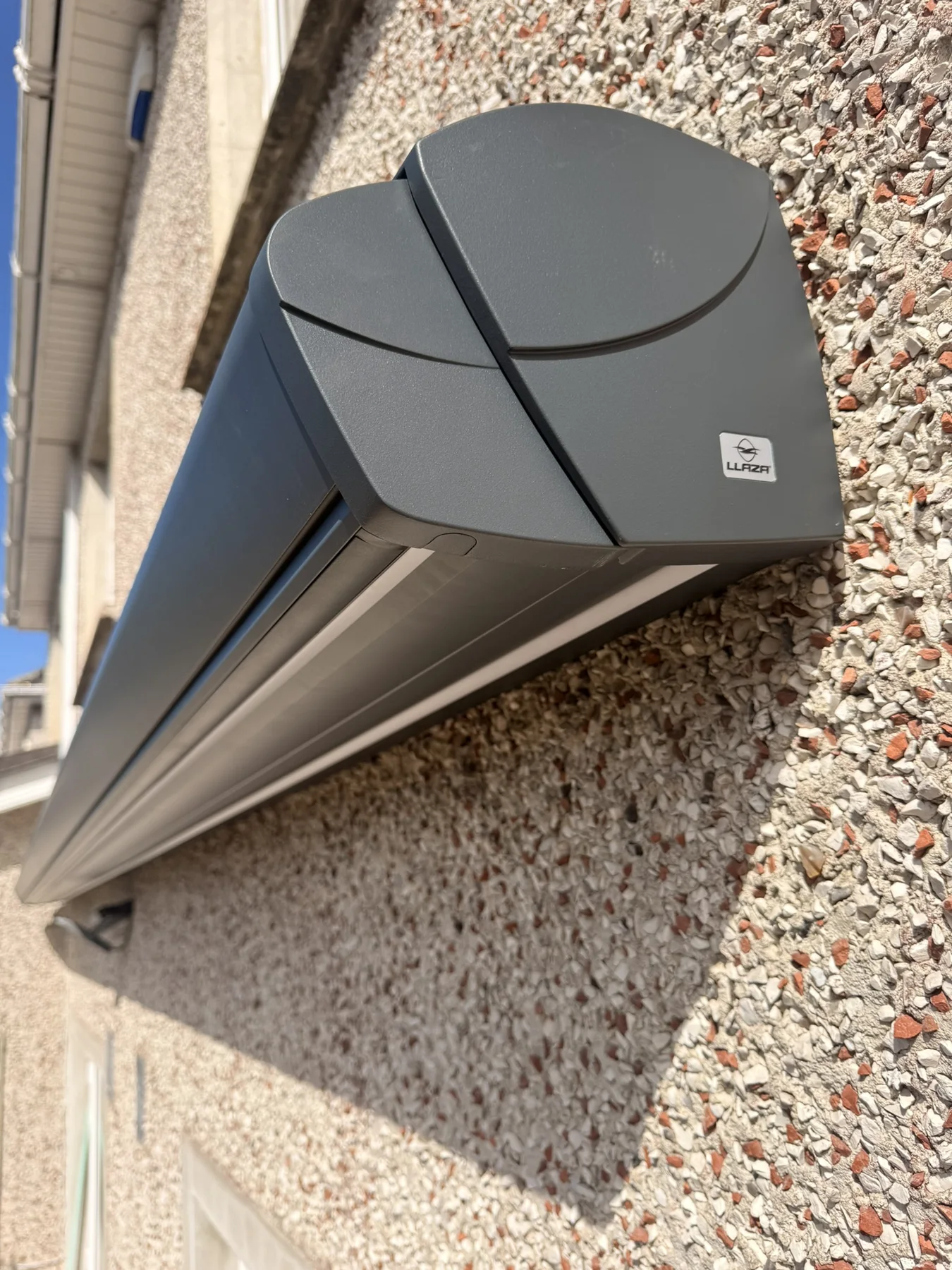 Close-up of the end cap and cassette on a premium retractable awning