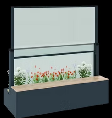 Glass windbreak with integrated seating detail in Kildare