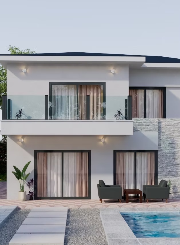 Glass windbreak beside a Dublin home and garden seating area