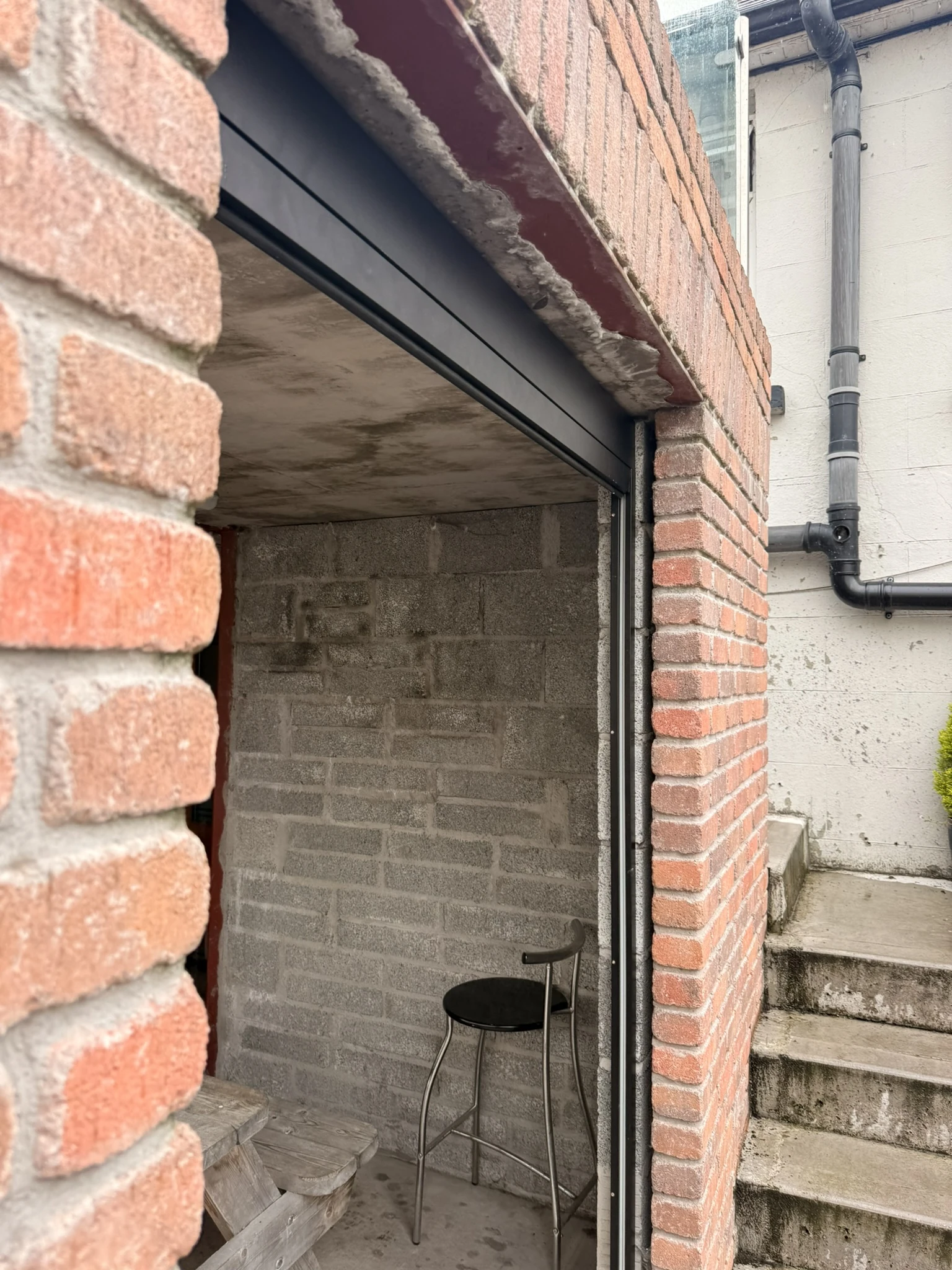 Full-width ZIP screen closing the front of a small garden room in Ireland